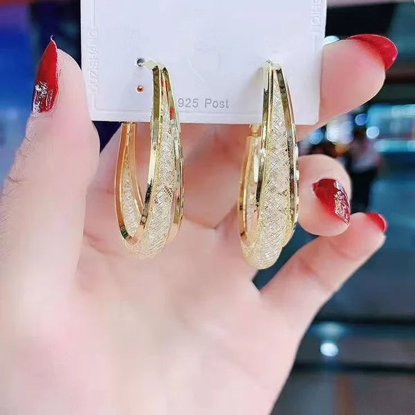 🔥 2024 new braided mesh oval earrings